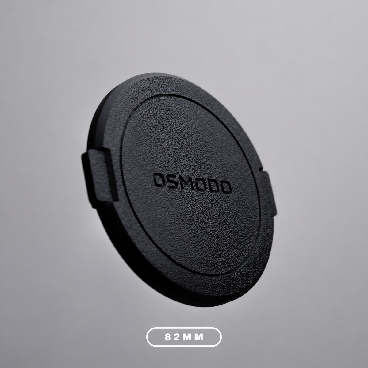Black OSMODO Lens Cap with an 82mm size label, for compatible OSMODO adapters with an 82mm filter opening.